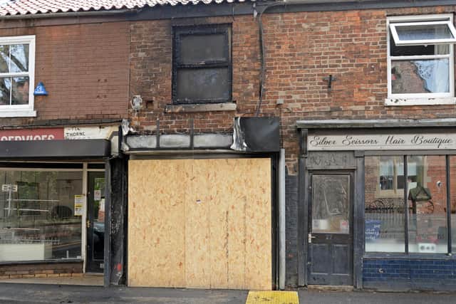 The business on King Street, which was set on fire after a Car crashed into the front.  Picture: NDFP-04-05-21-ThorneFire 3-NMSY
