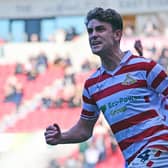 Harrison Biggins celebrates his goal.