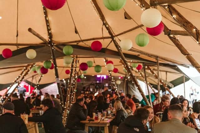 Grab a drink in the tipi bar