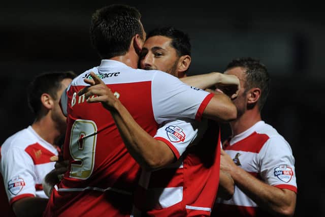 Billy Paynter celebrates a goal with Chris Brown