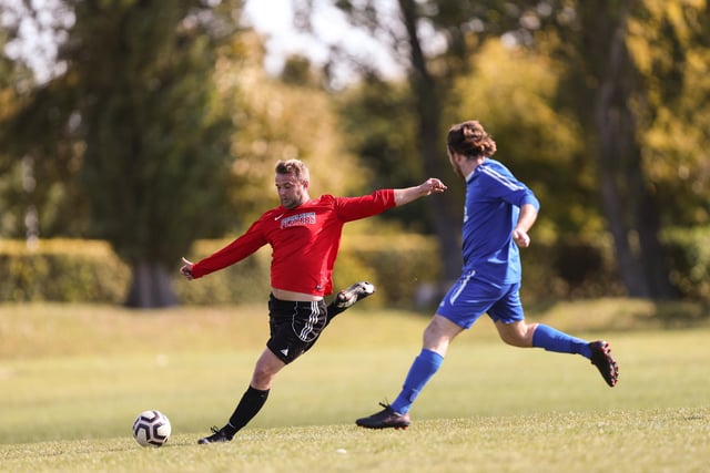 Wymering's Laurie McIntosh (left) and Frankie Scott of FC Strawberry. Picture: Chris Moorhouse