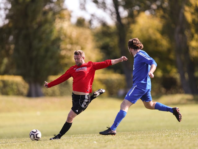 Wymering's Laurie McIntosh (left) and Frankie Scott of FC Strawberry. Picture: Chris Moorhouse