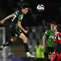 Liam Ravenhill wins the header. Picture: Howard Roe/AHPIX LTD