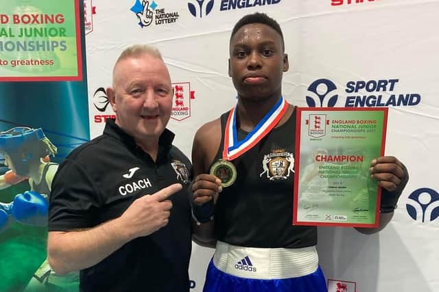 Gideon Anaba celebrates victory at the England Boxing National Junior Championships.
