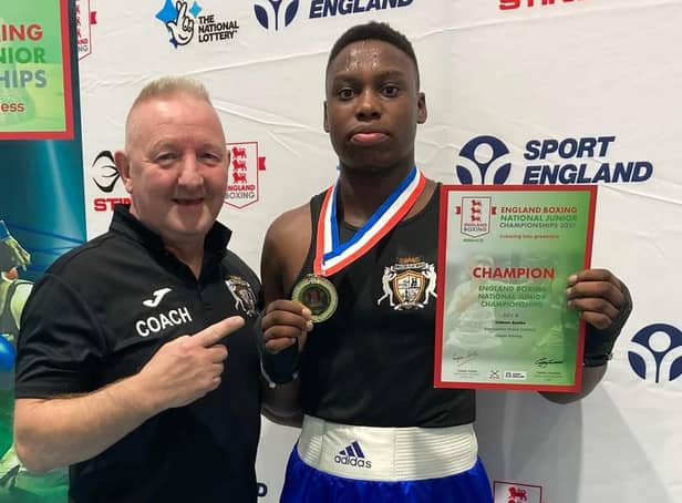 Gideon Anaba celebrates victory at the England Boxing National Junior Championships.