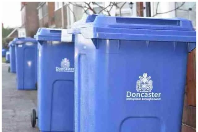 A man has been arrested after a wheelie bin was thrown at a car in Doncaster.