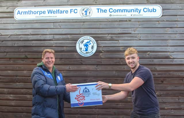 Kieran Woolley from the foodbank collected the donations and is pictured with Armthorpe Welfare chairman Steve Baskerville.
