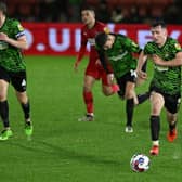 Doncaster's James Maxwell drives forward with the ball