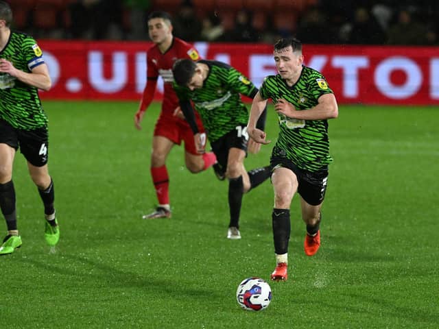 Doncaster's James Maxwell drives forward with the ball