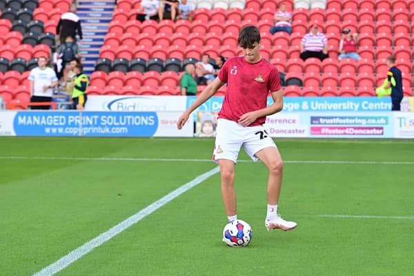 Doncaster's Jack Degruchy warms up ahead of the Lincoln City clash. Photo: Howard Roe/AHPIX LTD.