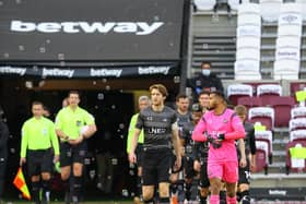Tom Anderson leads Rovers out at the London Stadium. Picture: Gareth Williams/AHPIX