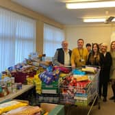 Pictured left to right - Chaz Prouten (Mex FB Volunteer), Sean Gibbons (Mex FB Manager), Gail Varley (Mex FB Volunteer), Jesse Sapey, Sam Sapey & Megan Cooper (WH Brown) & Kelly Houghton (Mex FB Volunteer).