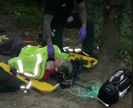 Louie Davies being treated at the scene by paramedics.