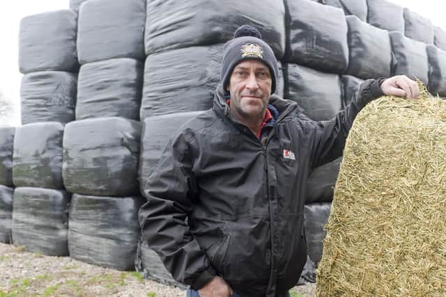 Fishlake farmer Steve Gillatt with his fuel contaminated land following recent flooding