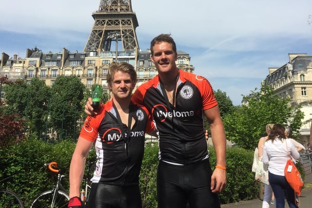 Sam Edgerley with his best friend and Bob Munro's son, Joe, at the finish line of their London to Paris bike ride for Myeloma UK in 2016