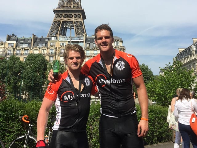 Sam Edgerley with his best friend and Bob Munro's son, Joe, at the finish line of their London to Paris bike ride for Myeloma UK in 2016
