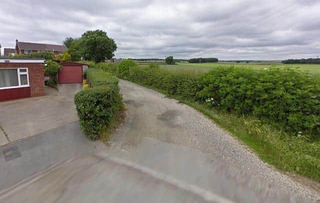 The planned entrance for the pig farm