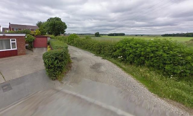 The planned entrance for the pig farm