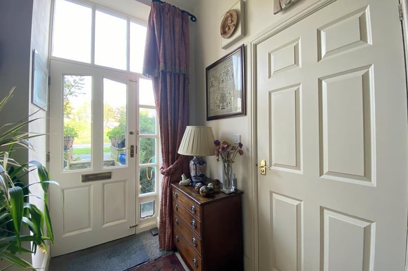 The home is described as a "spacious townhouse" set in "wonderful roling countryside".