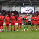Doncaster Rovers' players pay their respects to Richard Bailey. Picture: Andrew Roe/AHPIX LTD