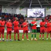 Doncaster Rovers' players pay their respects to Richard Bailey. Picture: Andrew Roe/AHPIX LTD