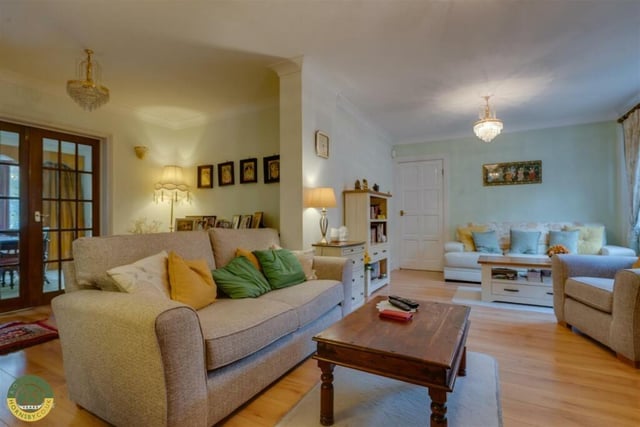 This room is currently a family room within the property.