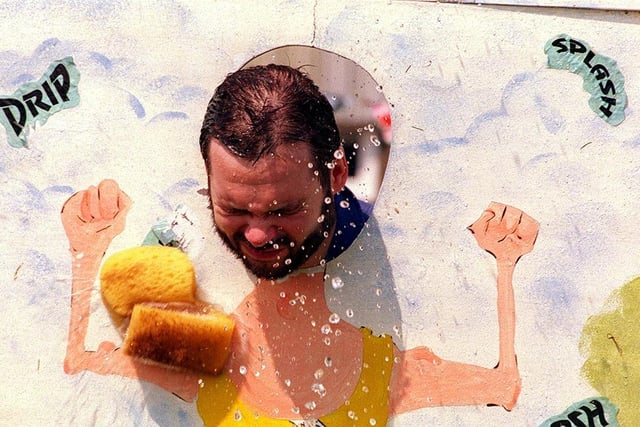 Above and byond the call of duty!  Edlington Comprehensive head Andy White gets dripping wet at the school gala in June 1996