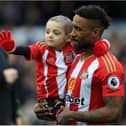 Footballer Jermain Defoe with Bradley Lowery.