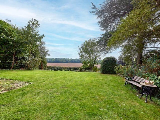 The garden backs on to open fields.
