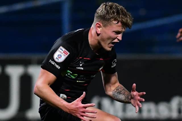 Doncaster Rovers' Jack Goodman despairs after a missed shot against Mansfield.