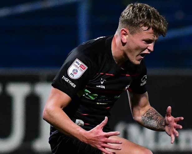 Doncaster Rovers' Jack Goodman despairs after a missed shot against Mansfield.