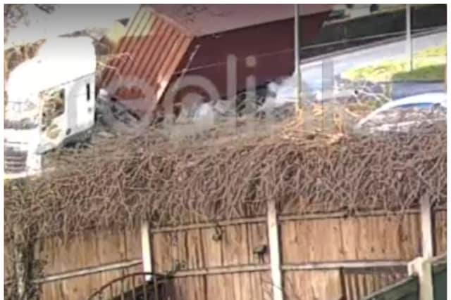 CCTV captures the moment a huge lorry overturned on a Doncaster roundabout. (Photo/video: Lola Sueniah).