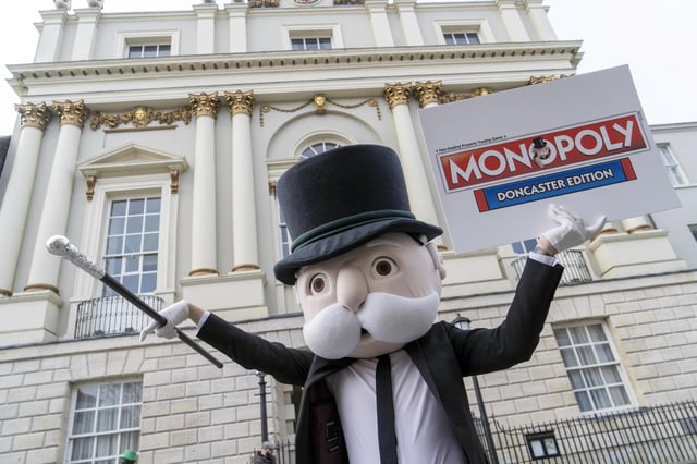 Launch of the Doncaster Edition of Monopoly. L-R Alolabi Omotola, Mr Monopoly, Lorna Reeve (Destination Manager) and Coun Bill Mordue. Picture Scott Merrylees