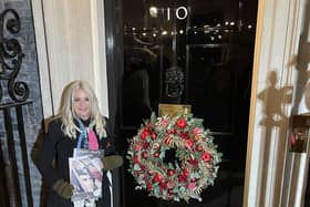 Christina outside number 10.