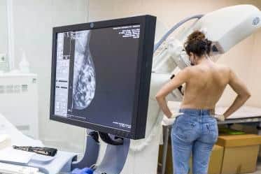 A mammogram gets underway