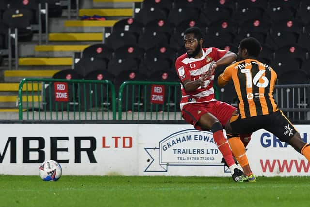 Cameron John cuts back away from Hakeeb Adelakun. Picture: Andrew Roe/AHPIX