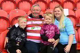 Doncaster Rovers confirmed promotion to League One with a 2-1 victory over Bradford City.