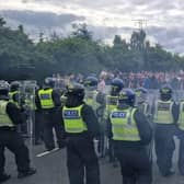 Protesters clashed with police in violent scenes outside a hotel in Wath yesterday afternoon.