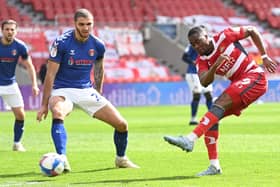 Fejiri Okenabirhie sends a tame effort towards goal against Charlton. Picture: Howard Roe/AHPIX