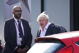 Former Prime Minister Boris Johnson arrives at Gatwick Airport in London, after travelling on a flight from the Caribbean, following the resignation of Liz Truss as Prime Minister. Picture date: Saturday October 22, 2022.