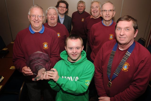 Members of the Mansfield Lions present £250 to swimmer Oliver Pratley to help with his swimming fund at the Gas Sport and Social club tonight  
Picture shows PresIdent Gerry Kelly front right with members along with Oliver with his Jnr Disabled Sports person of the year award