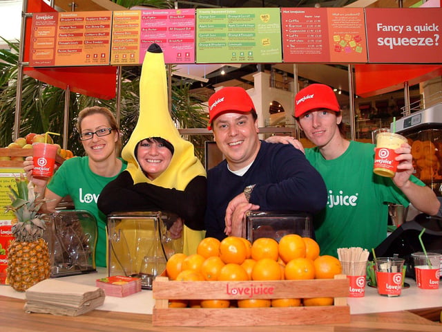 Lovejuice opened in Meadowhall Oasis Food Hall in 2006. John Heseltine, founder of Lovejuice, cutting a ribbon to officially open his latest store with his two Sheffield staff, Melanie Dydhe manager and Daniel Differ, trainee supervisor.