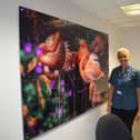Katie and her photography on display at DRI