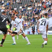 Doncaster Rovers' Luke Molyneux pulls a goal back against Milton Keynes Dons.