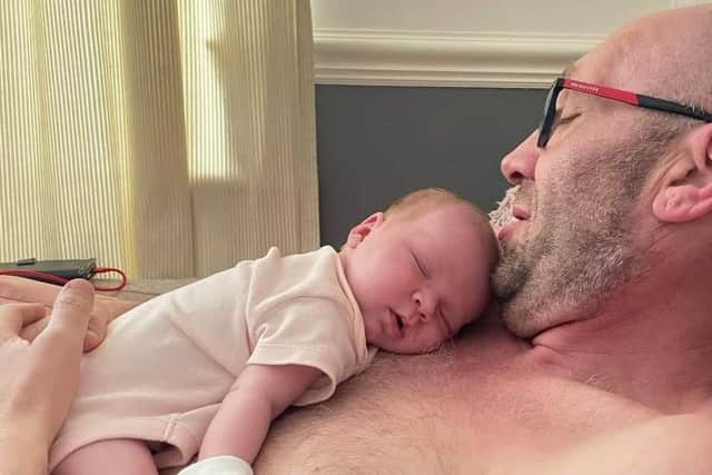 Mike and baby Esme.