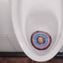 A target featuring the face of Margaret Thatcher was left in a Doncaster urinal following a Miners' Strike anniversary event. (Photo: Facebook).