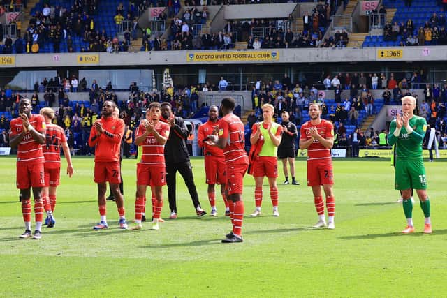 Rovers' players thank the travelling fans at Oxford for their support following confirmation of relegation to League Two. Picture: Gareth Williams/AHPIX LTD