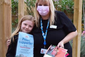 Chloe Smith met with Director of Nursing, Abigail Trainer, to receive her certificate and voucher to the Yorkshire Wildlife Park.