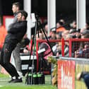 Danny Schofield on the touchline during his final game in charge against Walsall.