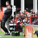 Danny Schofield on the touchline during his final game in charge against Walsall.